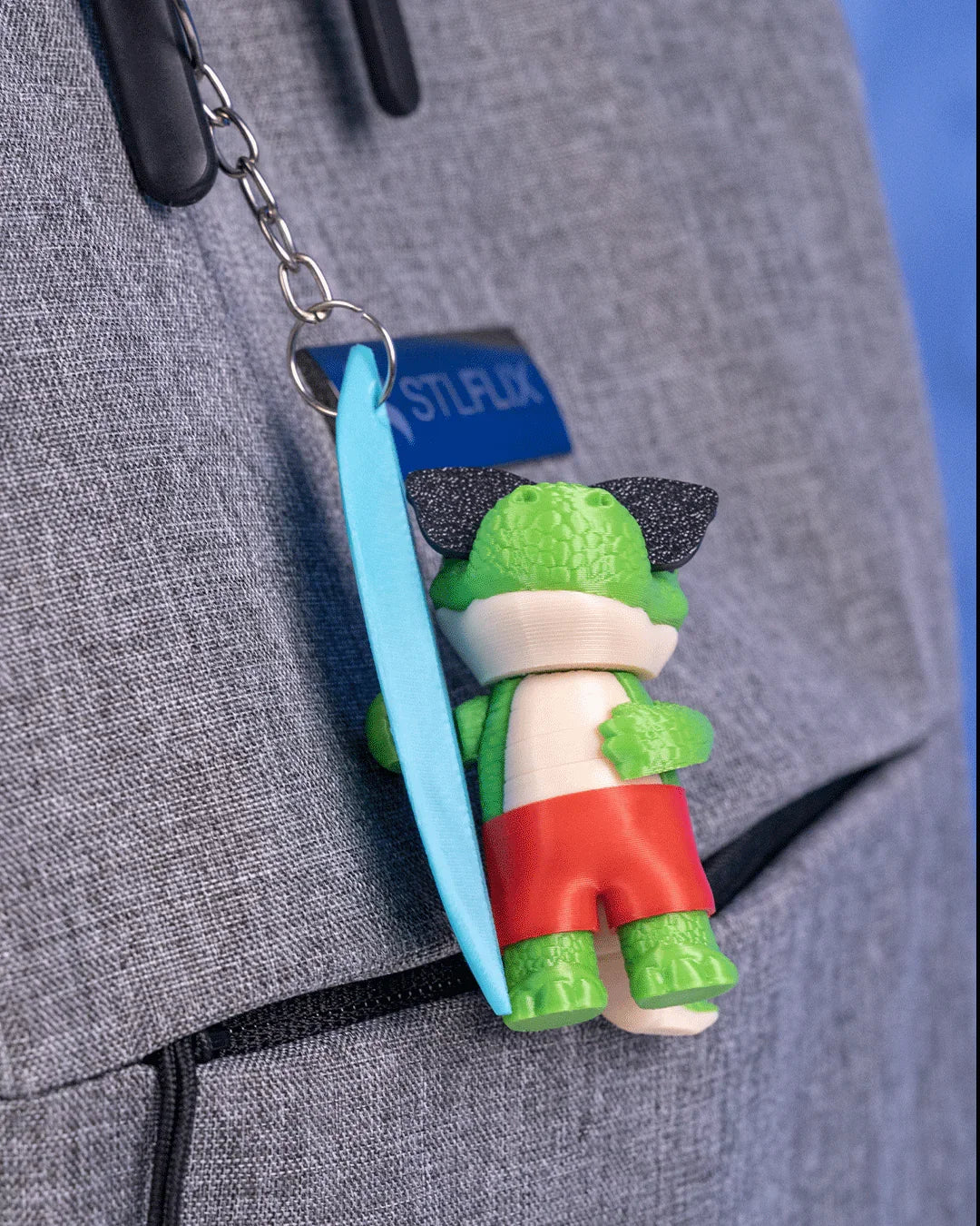 Tyranno-Surf Keychain – Dino Surfer Dude - Fusion Layer 3D
