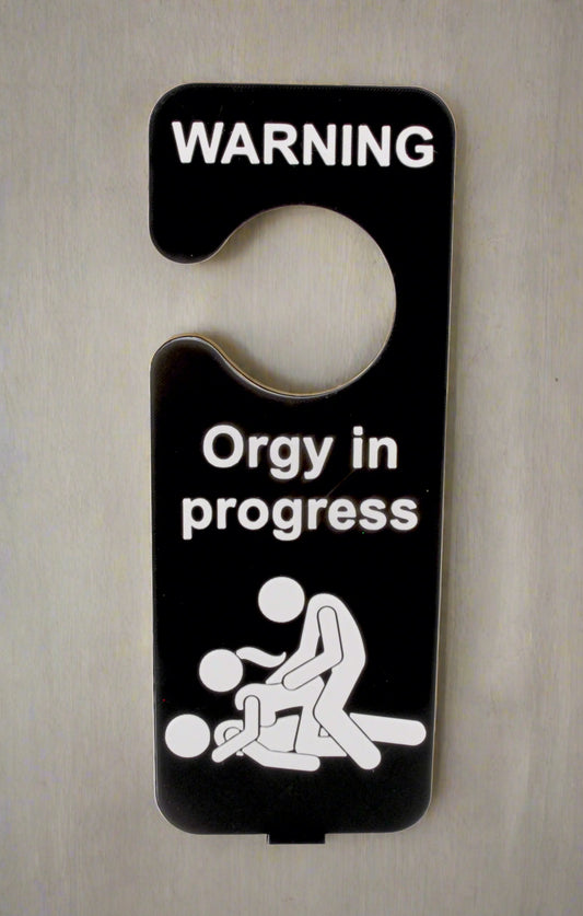 Door hanger with 'WARNING: Orgy in progress' text and graphic on a white background