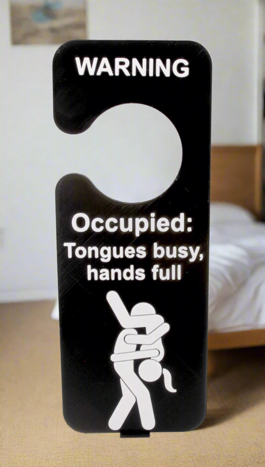 Door hanger with humorous message and graphic on a white background