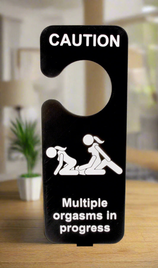 Black door hanger with white text and illustrations on a white background