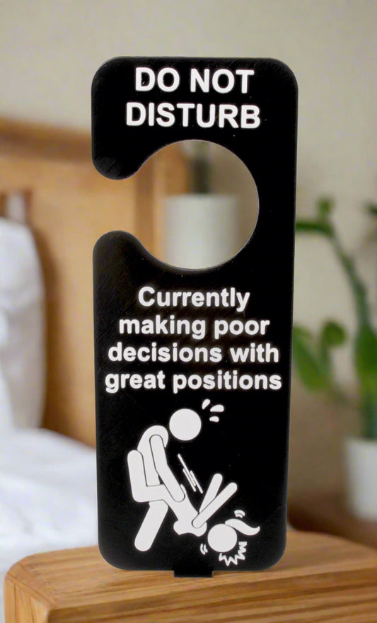 Door hanger with humorous text and graphic on a white background