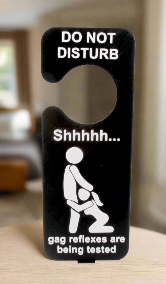 Door sign with humorous text and icon on a white background
