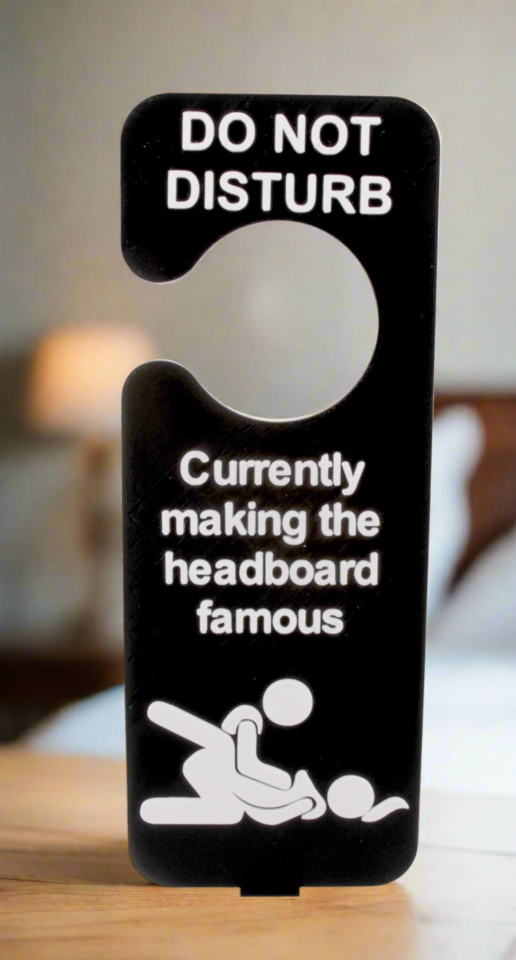 Door sign with humorous message about making a headboard famous
