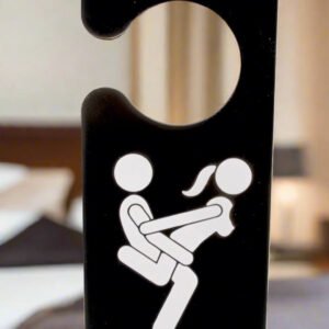 Door sign with humorous design and text on a white background