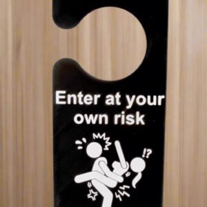 Black and white warning sign with humorous text and icon on a white background